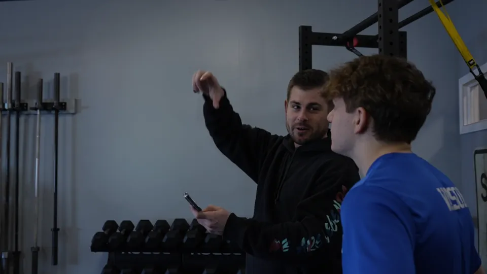 Kevin Kosis coaching athletes during a performance session