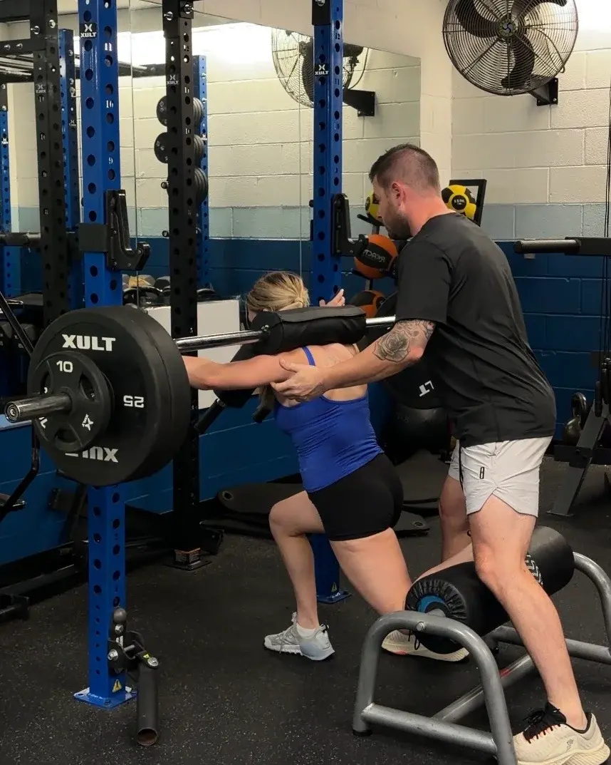 Kevin Kosis coaching an athlete during private training